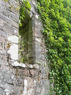 window in stone wall