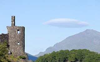 Flying Saucer Shaped Cloud by Kilchurn Castle, Scotland