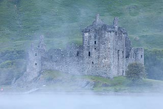 Kilchurn Castle by Loch Awe, Scotland, on a Misty Morning