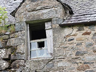 broken window in ruined house