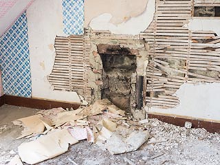 broken fireplace in garret room