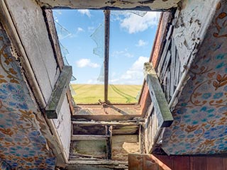 view through broken skylight