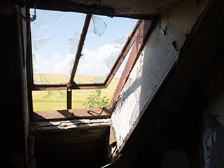 view through broken skylight